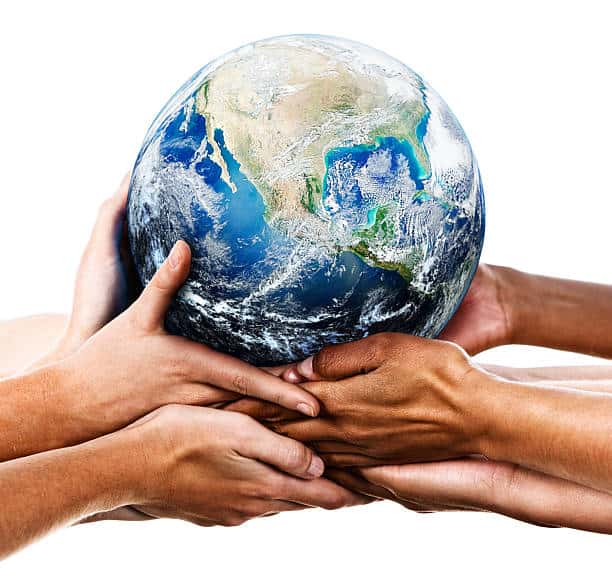 Many mixed hands cradling our home planet. Shows environmental awareness and an acceptance of responsibility for the care of our earthly home.